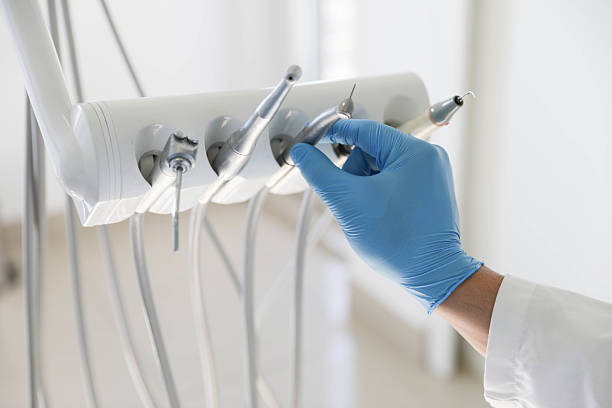 Professional Tooth Extraction technician working in Brenham, TX